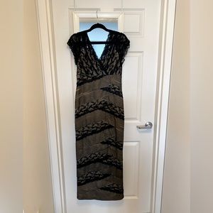 Marina floor length gown with lace and beading. Black and gold. Size 12.